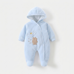 A light blue ribbed hooded baby footed sleeper with snap closures and a cute embroidered design on the chest featuring a duck, a banana, and a teddy bear.